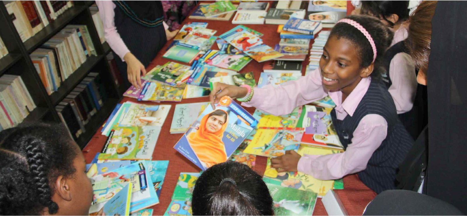 Read With Me tutoring — children choosing books together